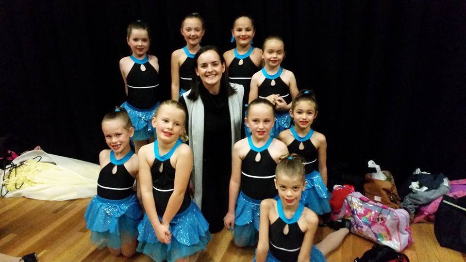 Jessie Myers with some of her students from the Port Macquarie Performing Arts.
