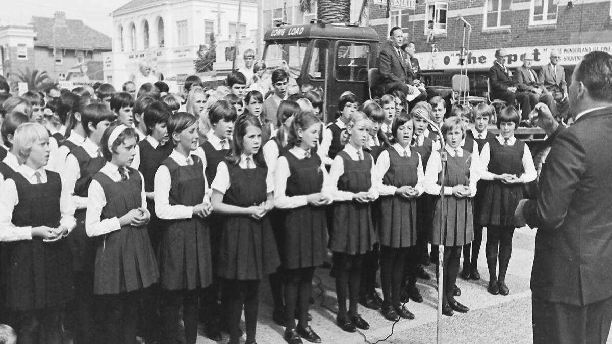 Youth participation: Port Macquarie High School Choir sings God Bless Australia at the Anzac Day service, 1968.