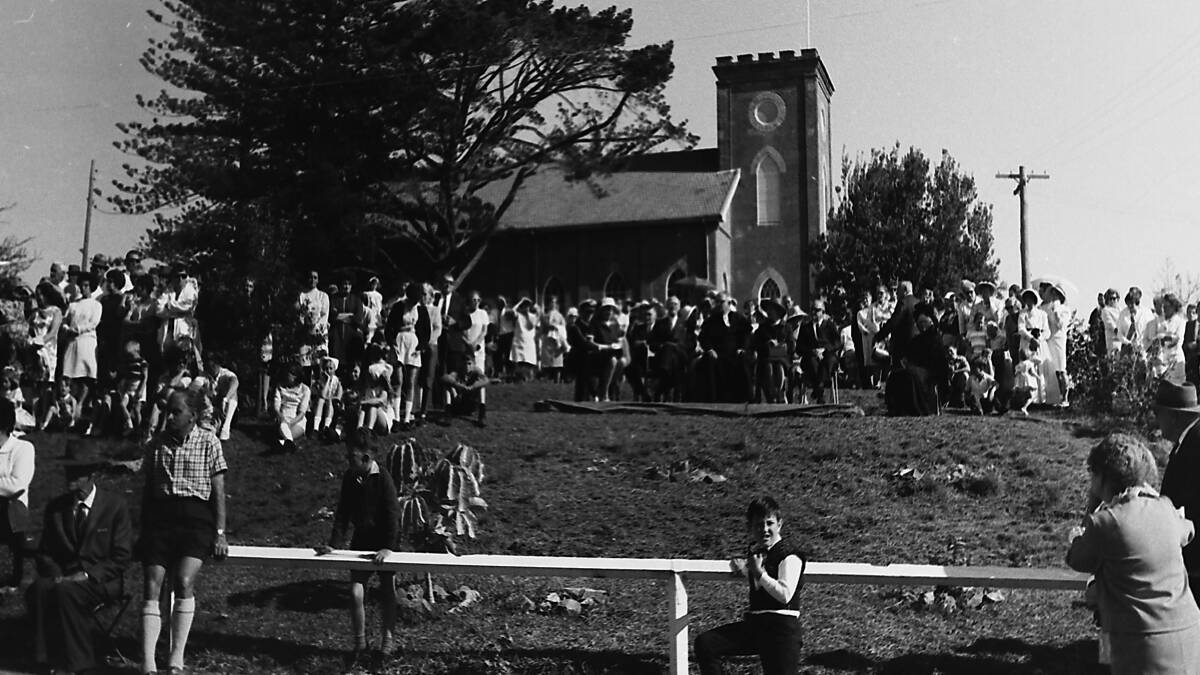 Well patronised: Sesquicentenary celebration crowds on the grounds of St Thomas' Anglican Church, 1968.