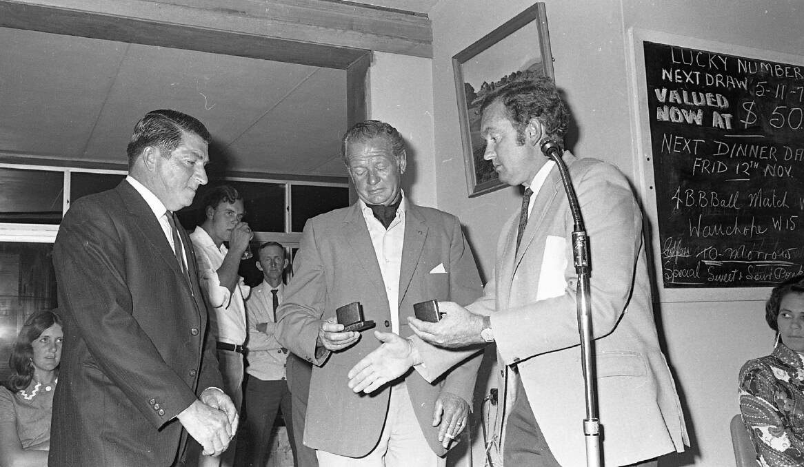 Deserved honour: Tony York and Athol Platt receive their life membership badges from Race Club President Brian Heagney, 1971. Photos: supplied by Port Macquarie Museum.