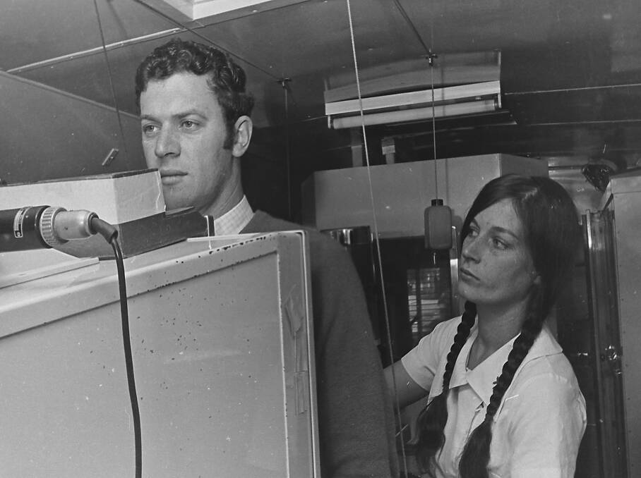 Primitive: Rodney Easton undergoes a Chest X-ray with the assistance of Nurse Keough, 1971. Photos: supplied by Port Macquarie Museum
