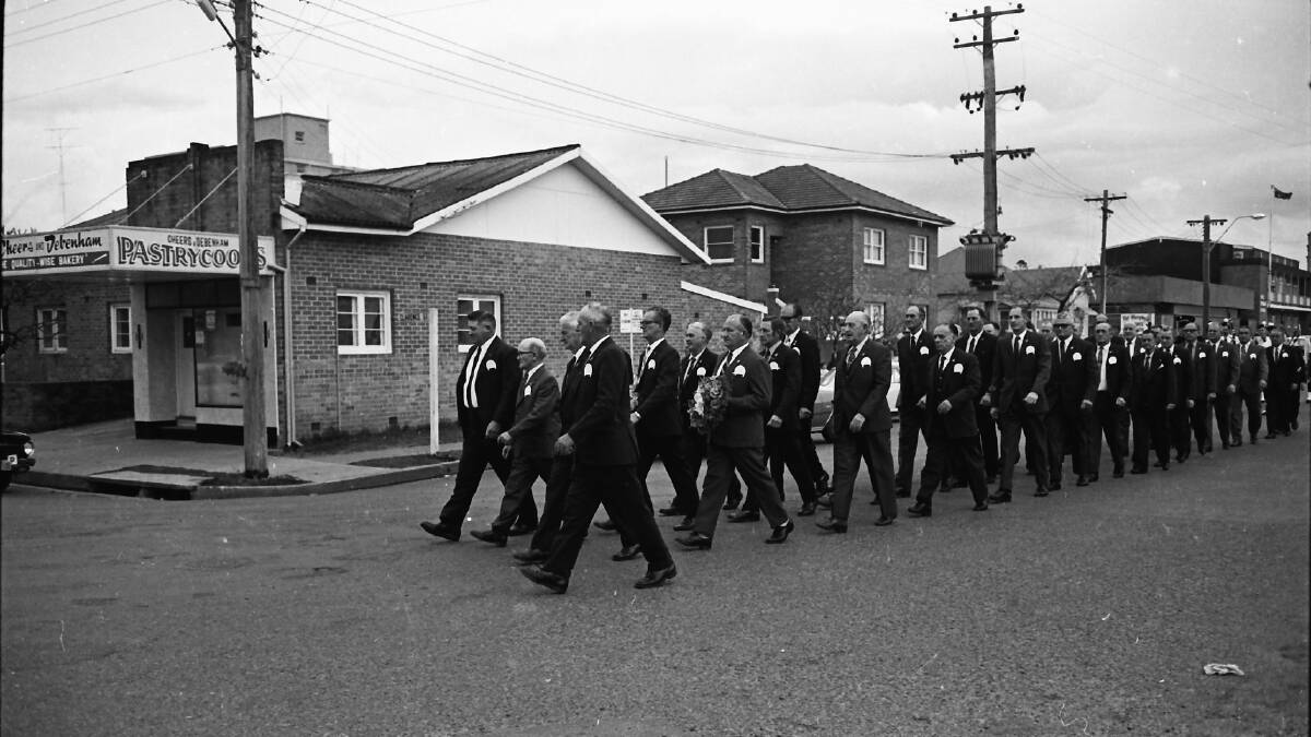 Proudly gathered: POWs march to the War Memorial before their re-union dinner, 1971. Photos: supplied by Port Macquarie Museum