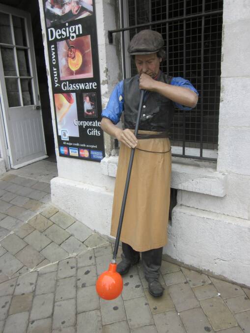 Not real: The glassblower outside the factory in Gibraltar is in fact a statue.