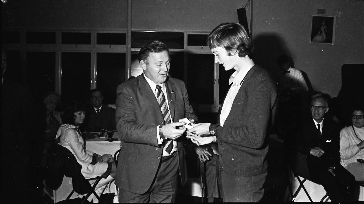 Sailing Club awards: Ted Hill presents a trophy to Rodney Jordan, the most improved V-Ess skipper and most improved skipper over all classes of boats, 1971.