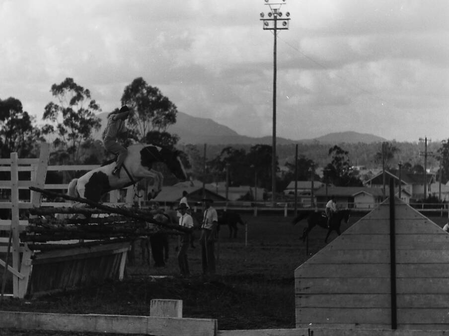 Points deducted: Johnny Fay of Landsdowne riding Comrade in the show jumping event at the Wauchope Show, 1963. 