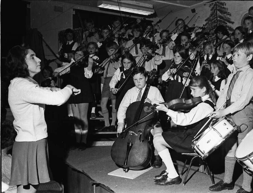 In tune: Pattie Johnson conducts the Port Macquarie Primary School orchestra, 1971.