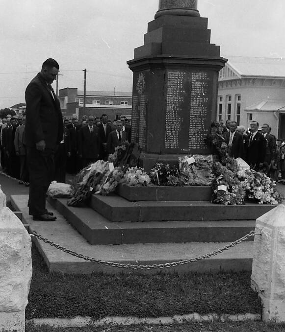 Lest we forget: RSL Sub-branch president Ken Radley lays a wreath at the Port Macquarie War Memorial, 1963. Photos supplied by Port Macquarie Museum