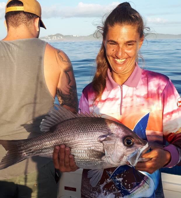Nice meal: Our Berkley Pic of the Week is Lisa with this terrific pearl perch she recently caught during a trip with Fish Port Macquarie Charters.