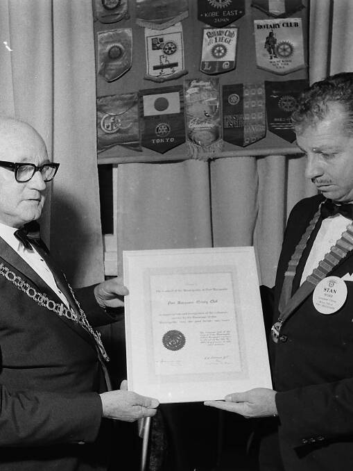 Changing the guard: Mayor C.C. Adams makes a presentation to Stan Ryder, Port Macquarie Rotary Club president, 1968.