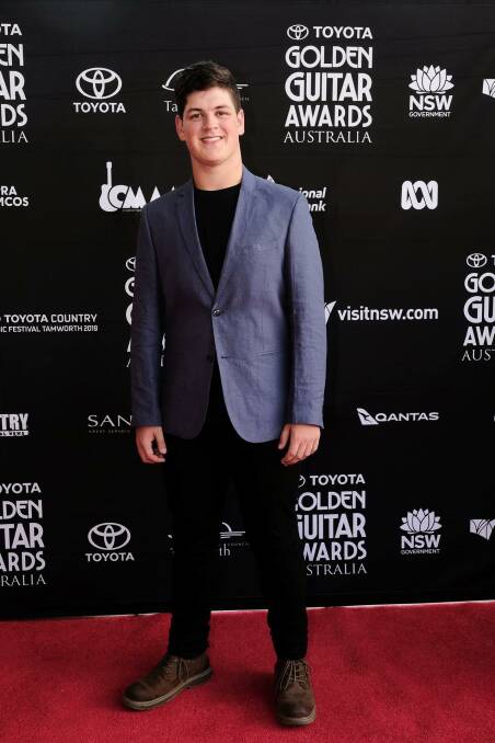 Star quality: Looking every bit the star, Port Macquarie's Blake O'Connor takes as turn on the red carpet before the Golden Guitar Awards in Tamworth where he was a presenter.