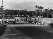 Schoolchildren crossing the Lake Cathie bridge to transfer from one bus to another, 1972. Photos supplied from Port Macquarie Museum archives.