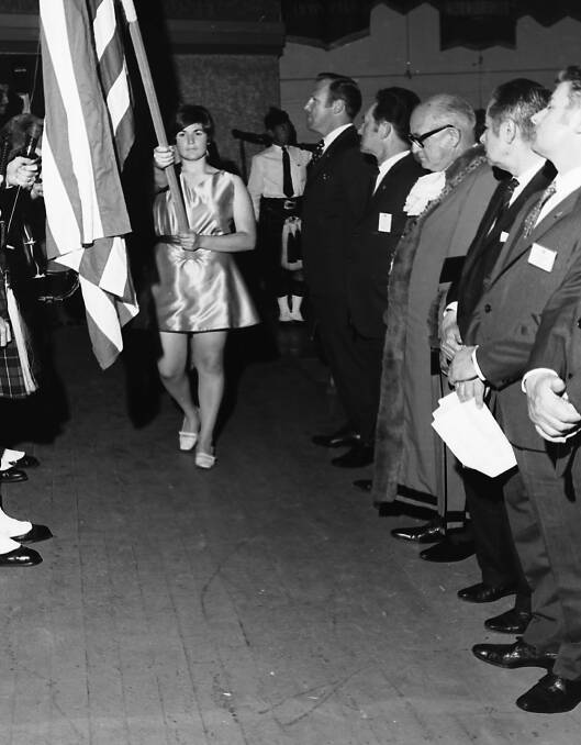 Pomp and ceremony: Anne Drewitt, the first of the standard bearers at the Presentation of Flags, part of the opening session of the Lions Convention, 1969.