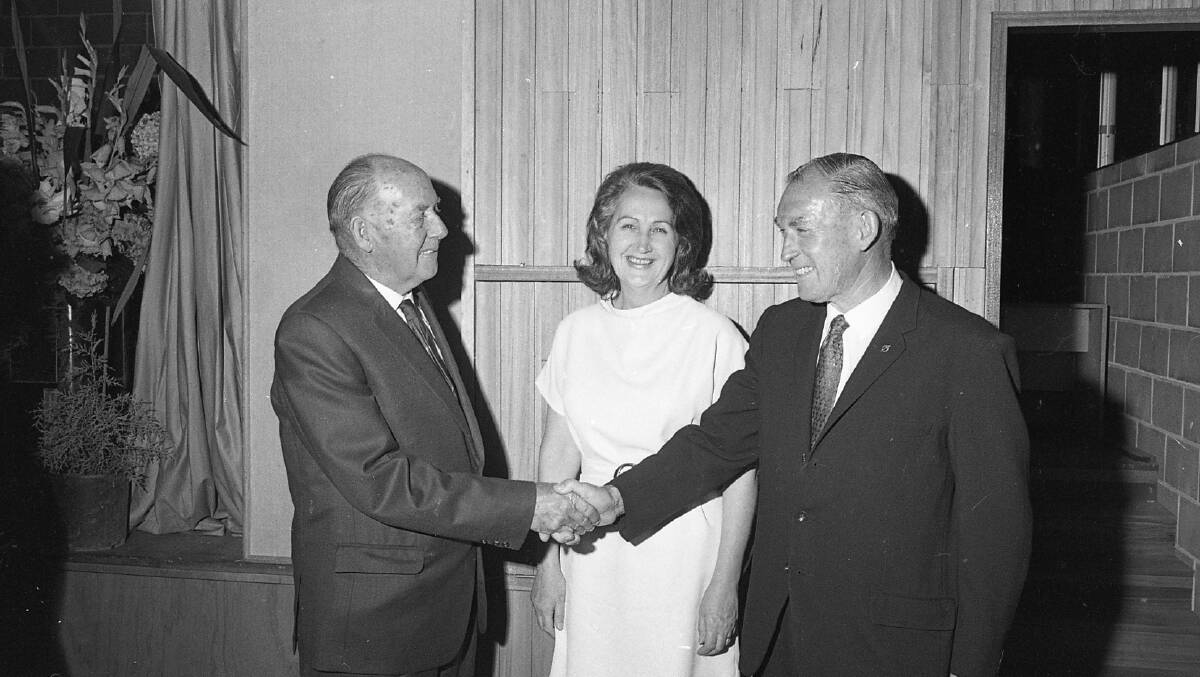 P&C president Dr McLaren congratulates Stan Condon watched on by Mrs Condon. 1971. Photo supplied by Port Macquarie Museum 