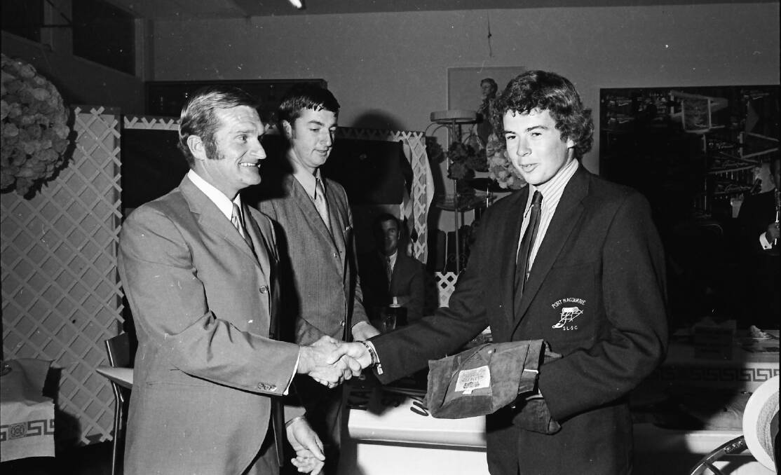 Dennis Green congratulates Peter Waters as Junior Club Champion, 1971.