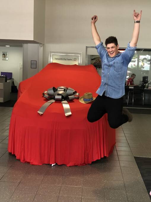 Quite a leap: Port Macquarie's Blake O'Connor performs the 'Oh what a feeling' leap as he is presented with his Toyota he won for a year as 2019 Toyota Star Maker.