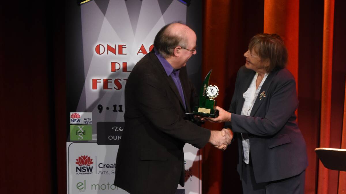 Congratulations: Director of Players Theatre entry That was no Lady - That was a Private Eye, Lance Thompson receives the award for Runner-up Best Production from deputy mayor Lisa Intemann at the One Act Play Festival.
