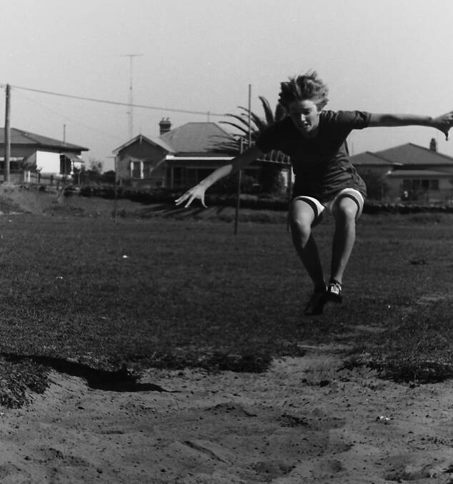 Lift: School captain Judy Turnham gives her all in the senior girls broad jump, 1969. Photo supplied