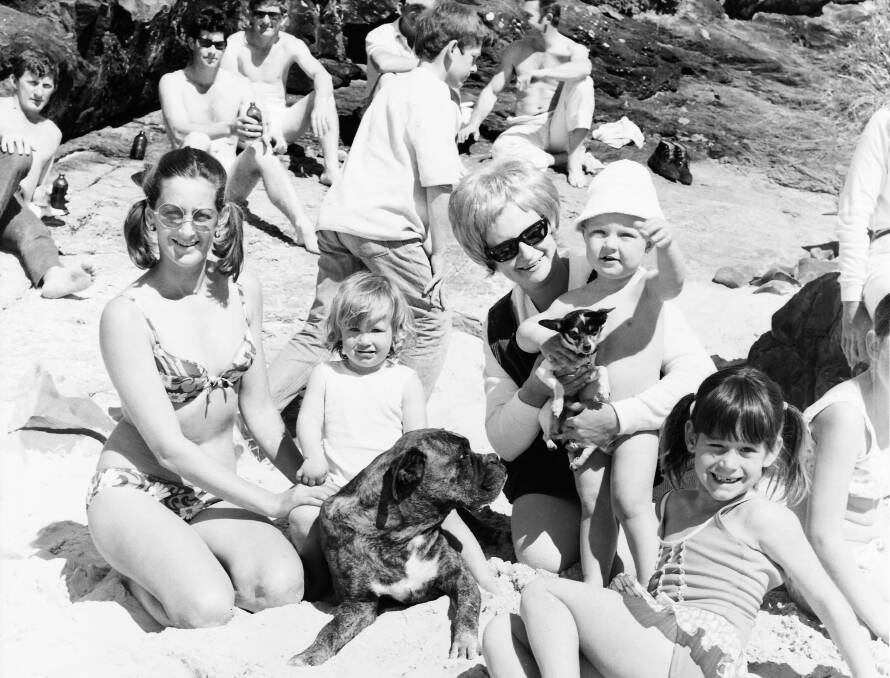 Summer time: Enjoying Port Macquaries sunshine Rosemary Payne with her two daughters and their dog Caesar, and Diane and Matthew Styles, 1970. Photo: supplied