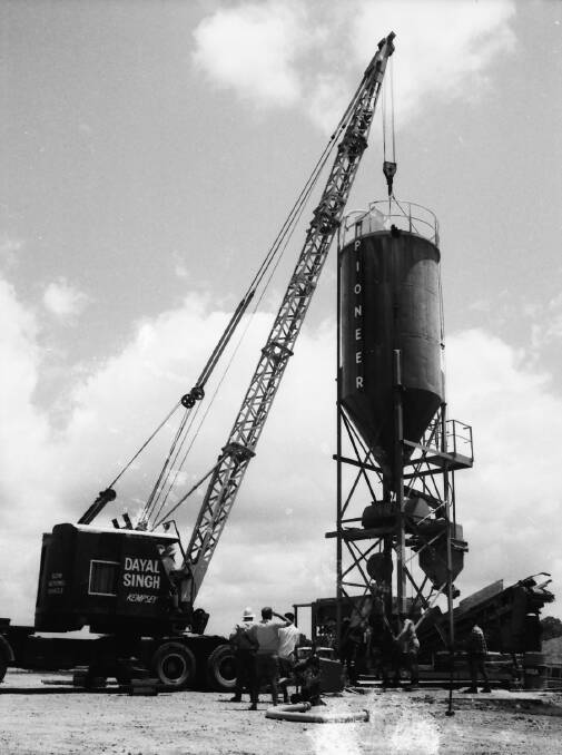 Better access: Raising Pioneer Concretes cement silo at Hibbard, 1970