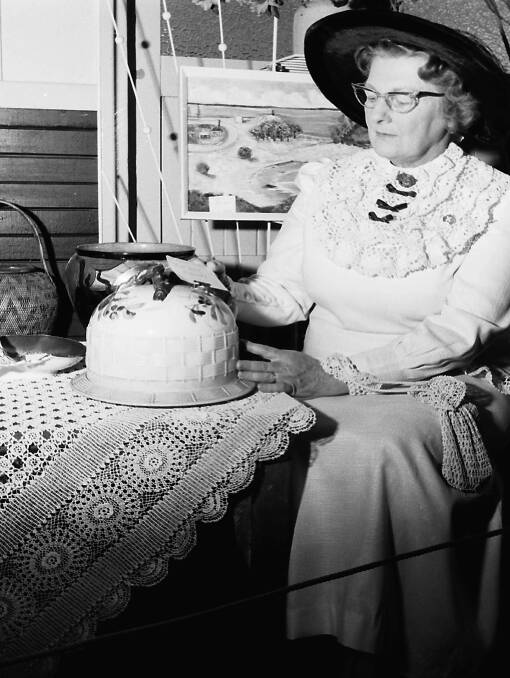 Of the era: Mrs Ella Evans looks the part at the Sesqui Centenary craft and antique exhibition, 1968.