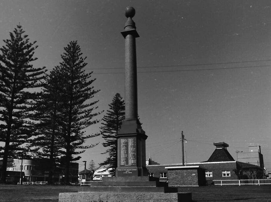 On the move again: Port Macquarie War Memorial in its new location on Town Green, with the old post office in the background,1969. 