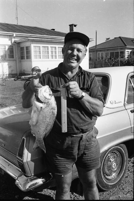 Visiting fisherman, Ron Player, with his 4lbs. 4 ozs. bream caught at Point Plomer, 1971.