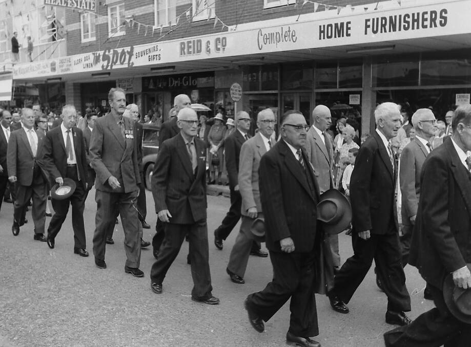 Diggers: Returned servicemen proudly march along Horton Street during the Anzac Day march, 1963.