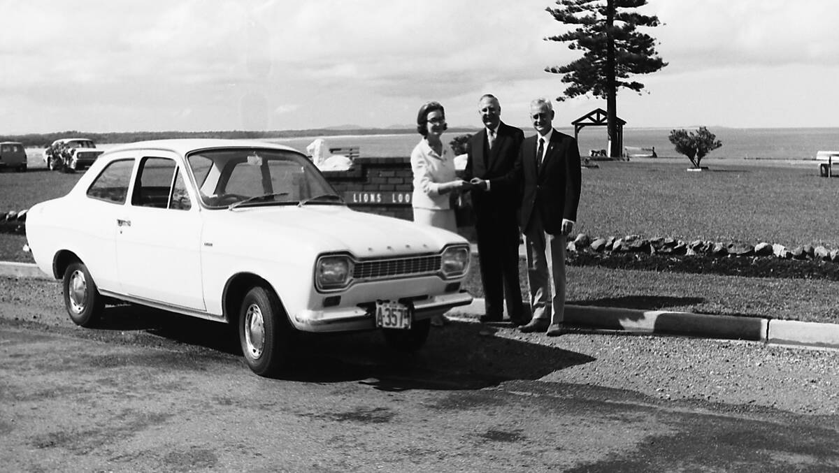Generous donation: Mrs and Ald Westerweller hand the keys of a Ford car over to Allan Mettam for the Lions Club Art Union prize, 1970.