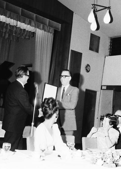 Arnold Forsyth presents the Charter to Chamber of Commerce president, Warwick St. Clair, 1969. Photo supplied by Port Macquarie Museum.