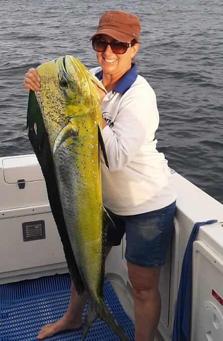 Sensational: Our Berkely pic of the week shows Kris from Maitland, with the monster mahi mahi she caught during a trip to the FAD with Fish Port Macquarie Charters.