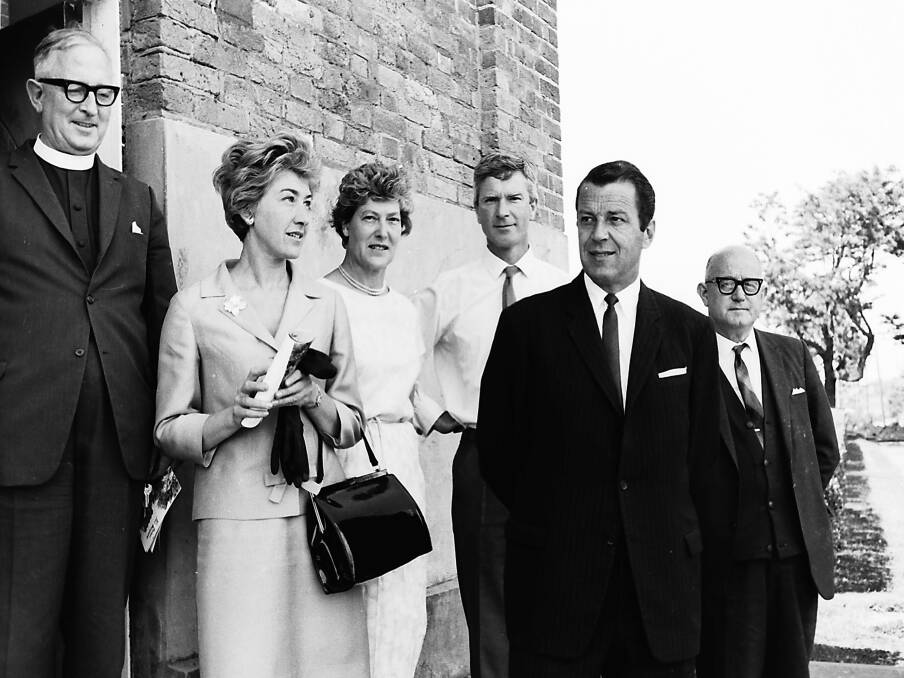 Archdeacon Warr, Miss Hobbs, Mrs Gibson, Dr Harry Hodgson, Mr Don Chipp, Minister for Tourism and Minster for the Navy, and Mayor Ald C. C. Adams outside St. Thomas’ Church, 1967.