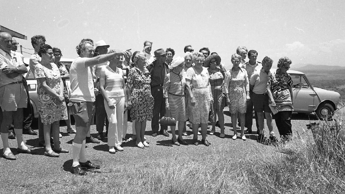 Jim Pearse from the University of New England points out items of interest on a field trip during the Port Macquarie Conservation Seminar, 1971.