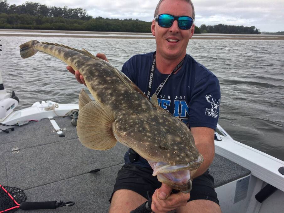 Sent back: Our Berkley pic of the week is Mick Smith with this sensational flathead he recently caught then released while chasing whiting at Blackmans Point. 
