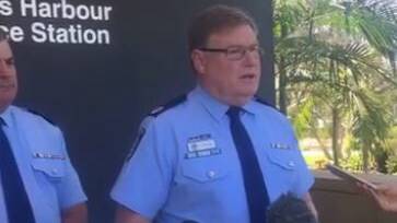 Police address the media at Coffs Harbour.