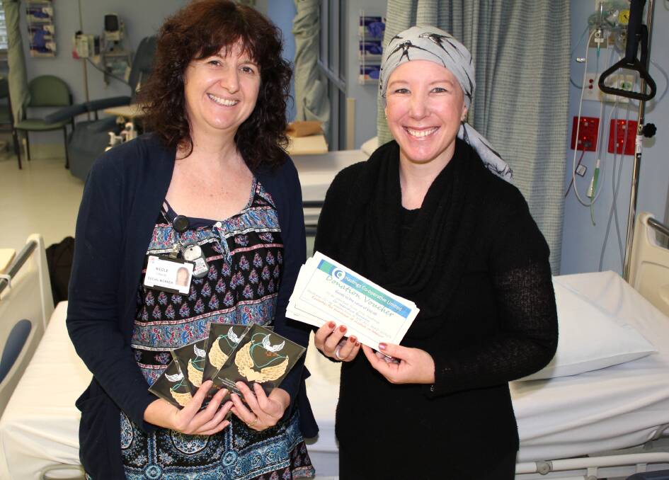 Donation: Skye Petho from If We All Hand Wings and Nicole Edwards from Mid North Coast Cancer Institute.