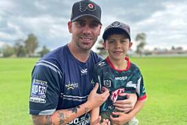 Sam Taylor with his son, Leo, who has inspired the new Cowboys signing to ensure that his next few years rank among his best. Picture by Zac Lowe.