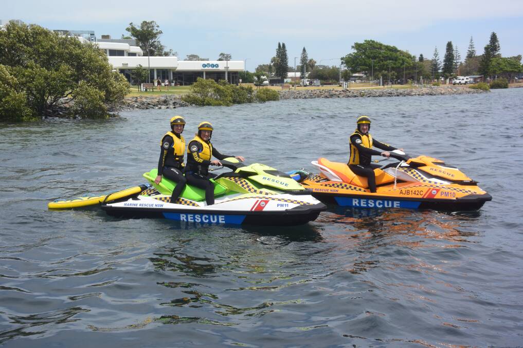 SAVING LIVES: Yolanda Bosschieter, Ali Cameron-Brown and Bill Richardson on the two Marine Rescue jetskis that will be out saving lives this summer. PHOTO: Laura Telford.