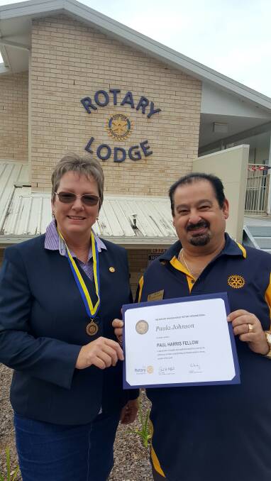 GREAT ACHIEVEMENT: Paula Johnson and president Tony Lanzafame at Rotary Lodge. Photo: Laura Telford.