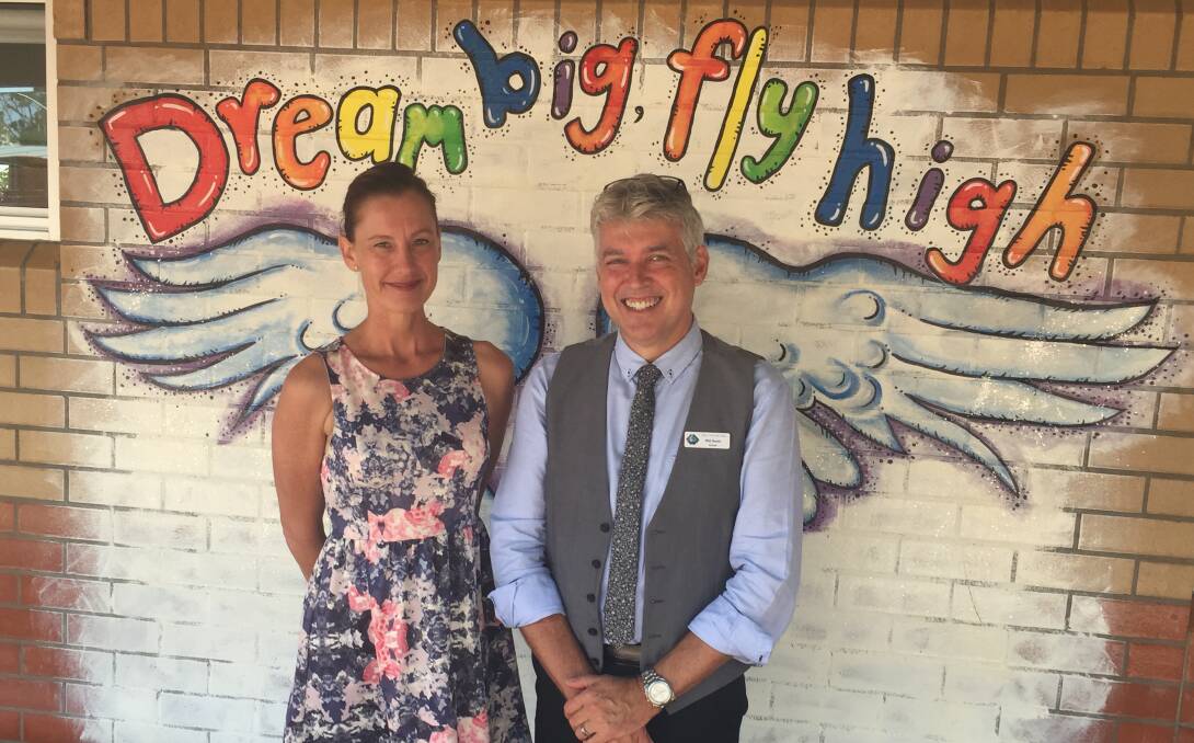 HORRID ACT: Tacking Point Public School's teacher librarian Lea Horan and principal Phil Harris say the vandalism needs to stop. Photo: Laura Telford.