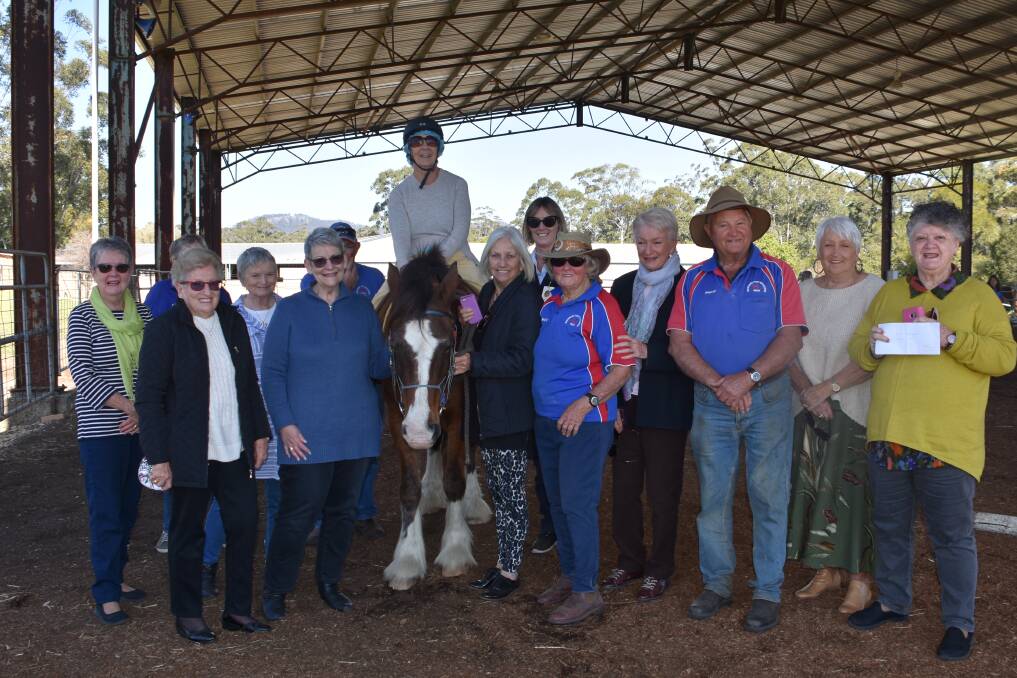 LOVE: Inner Wheel members with the crew from Riding for the Disabled. PHOTO: Laura Telford.