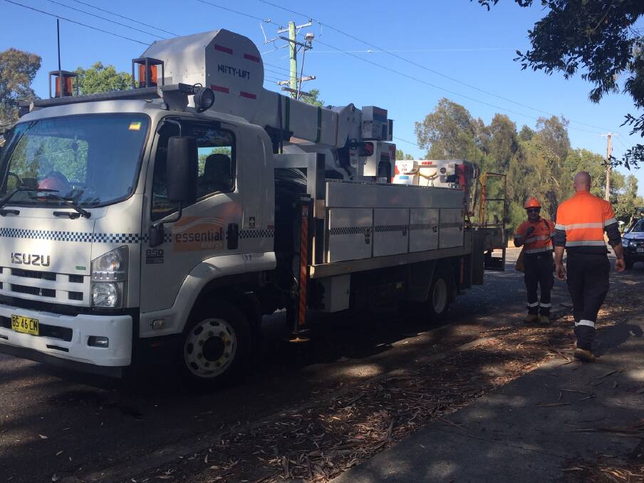 FIXING: A contingent of Essential Energy workers were on scene to fix the problem. PHOTO: Laura Telford.