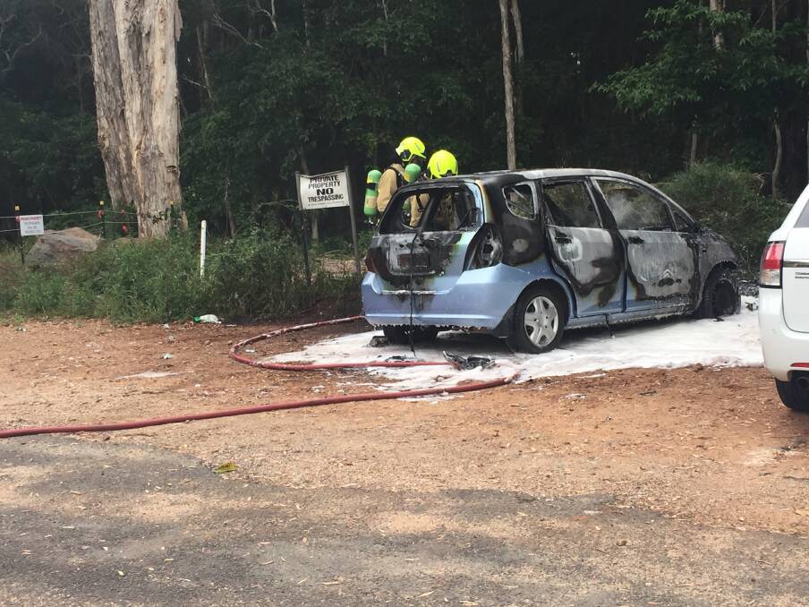 BURNT: The car was left and torched in Hastings Avenue. PHOTO: Laura Telford.