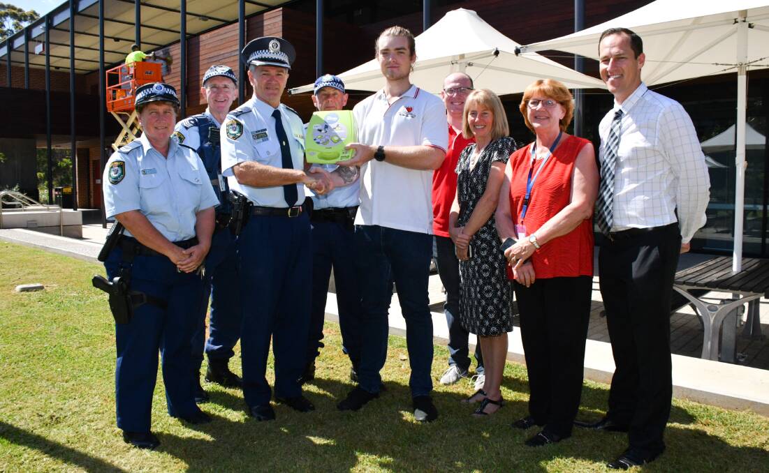 GREAT EFFORT: Senior constable Wendy Hudson (Youth Liaison officer), Sgt Ben Hall, Superintendent Paul Fehon, Sgt Ron Mudford, Brandon Robinson (student), Adam Lowes (President of Student Heart Project), Tracey Green (Executive Dean faculty of Business, Justice and Behavioral Science, Professor Heather Cavanagh and Phillip Ebbs (Senior Lecturer in Para Medicine). Photo: Oscar Carter.