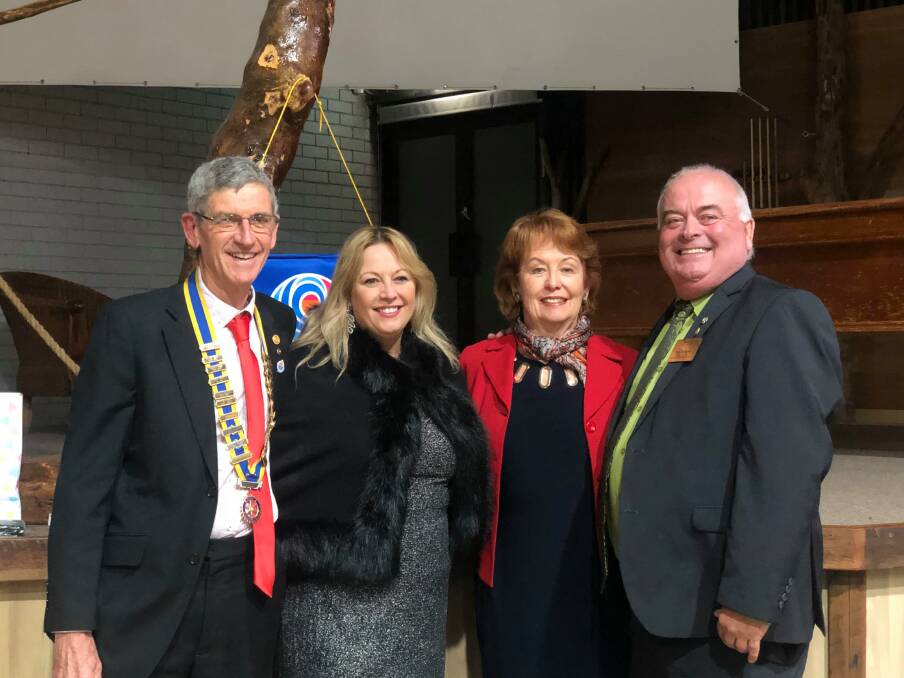 CELEBRATE: Outgoing president Malcolm McNeil, Port Macquarie-Hastings mayor Peta Pinson, incoming president Carolyn Ireland and District 9650 district governor nominee designate David Mayne at the dinner.