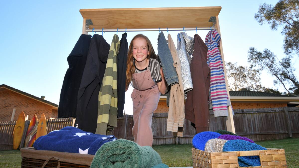 HELPING HAND: Kirra Porter with some of the clothes she has already collected. Photo: Ivan Sajko.
