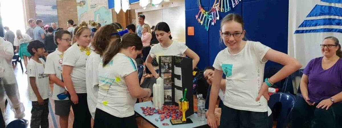TEAM WORK: The girls had a stand at the national final where they were able to meet with lots of other teams.