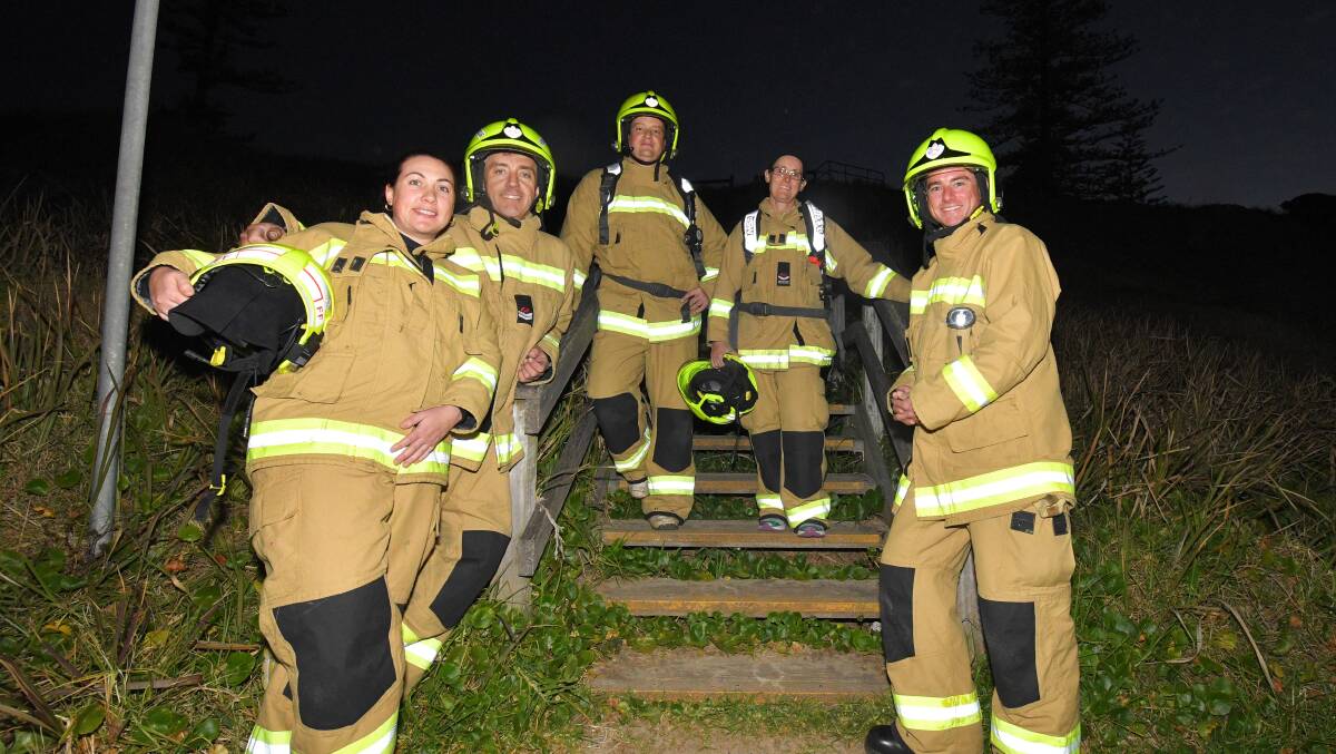 IN TRAINING: Firefighters Emma Parke, Gav Lisk, Seth Vagg, Sonia Nash and Andrew Fullerton training at Town Beach before the big climb in October. Photo: Ivan Sajko.