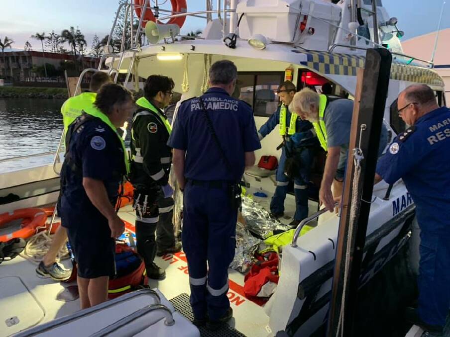 LUCKY TO BE ALIVE: Marine Rescue Port Macquarie along paramedics and the Westpac Rescue Helicopter rescued three men off a sinking boat overnight. PHOTO: Marine Rescue Port Macquarie.