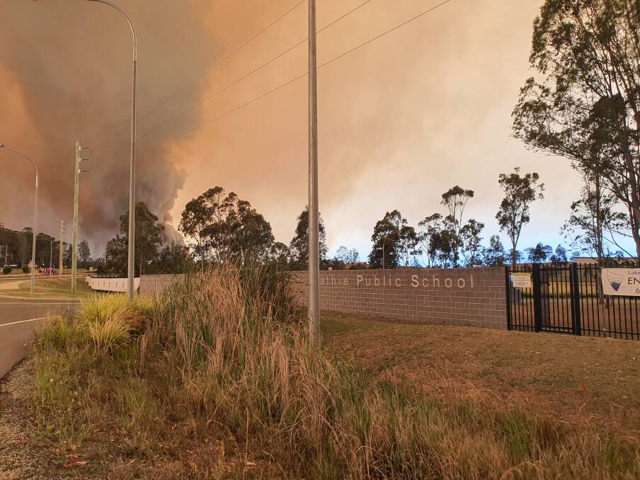 SMOKE: On Tuesday the sky above Lake Cathie Public School was black and orange. PHOTO: Laura Telford.
