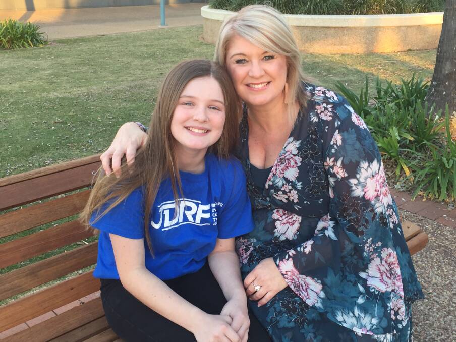 LIVING WITH DIABETES: Charlotte Kennedy and mum Emily Acheson are ready to take on Canberra raising awareness for juvenile diabetes. Photo: Laura Telford